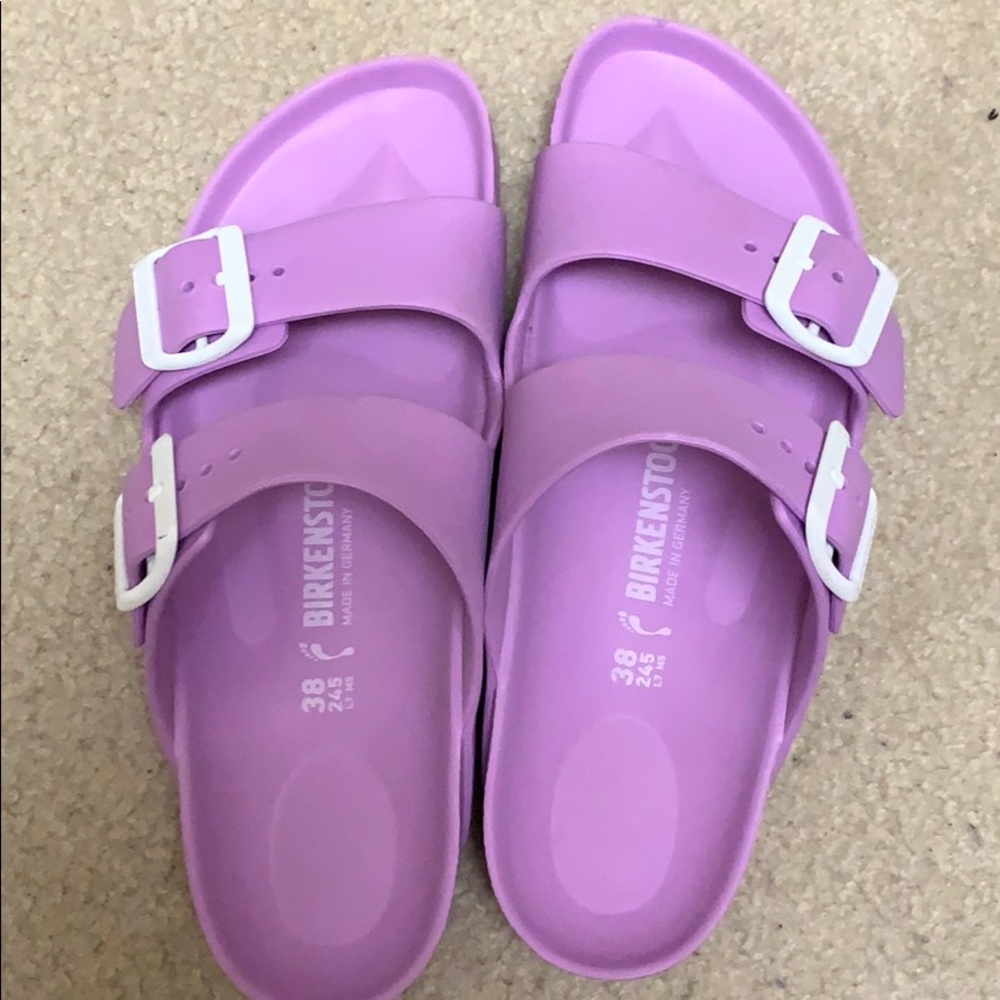 birkenstock’s- purple and waterproof slides